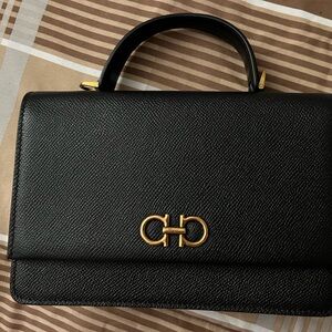 BLACK AND GOLD FERRAGAMO PURSE!